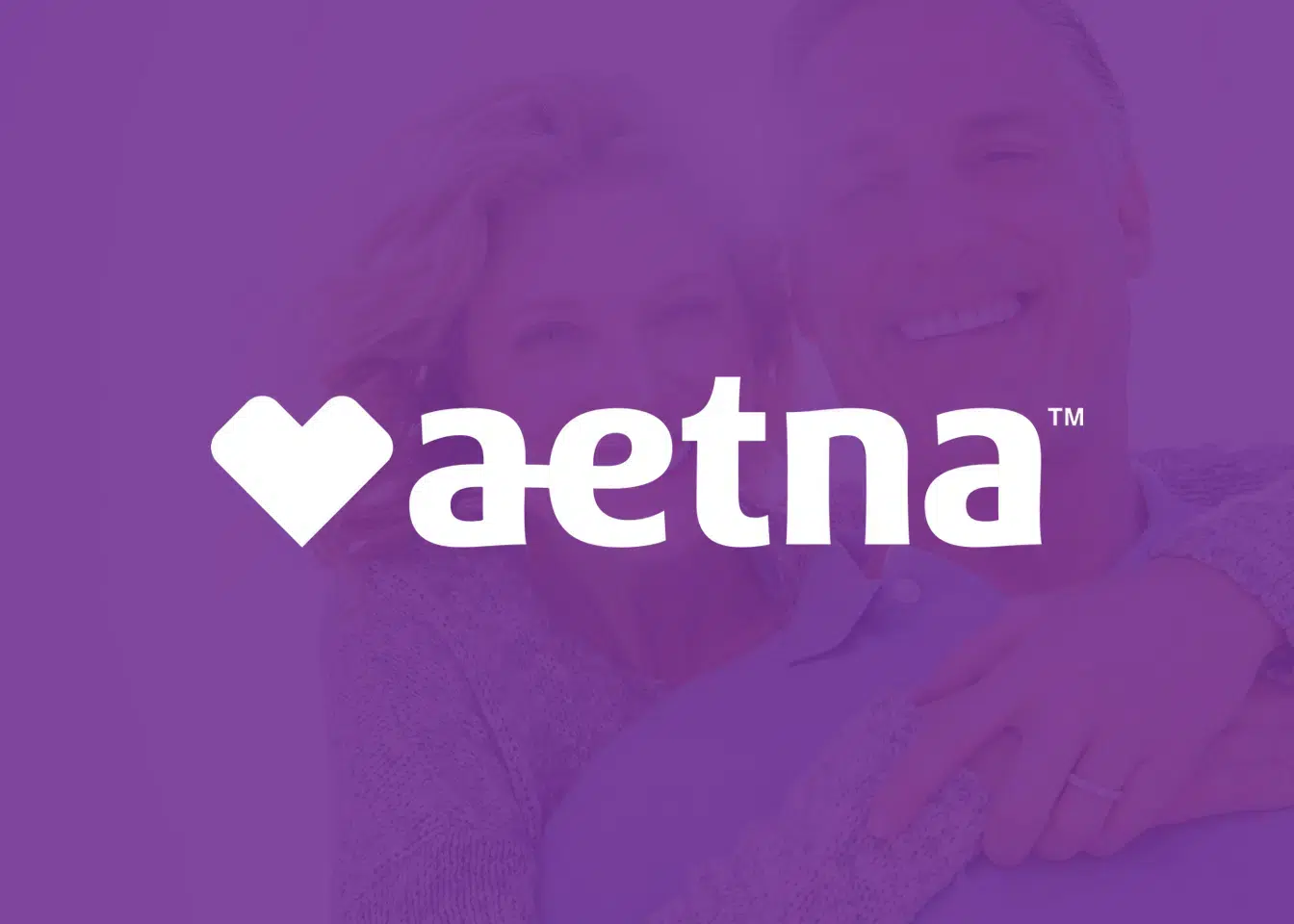 Aetna logo with heart symbol on purple background for dental insurance provider.
